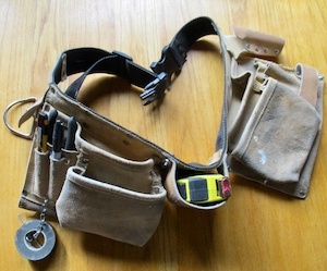 Photo of a tool belt with tools.